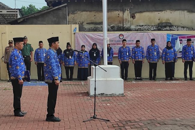 “UPACARA PERINGATAN HARI ULANG TAHUN KORPS PEGAWAI  REPUBLIK  INDONESIA  KE  -  54 TINGKAT KECAMATAN TULUNG KLATEN TAHUN 2025”.